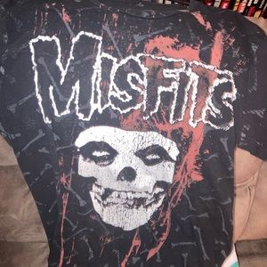 Size large misfits shirt fits like a medium